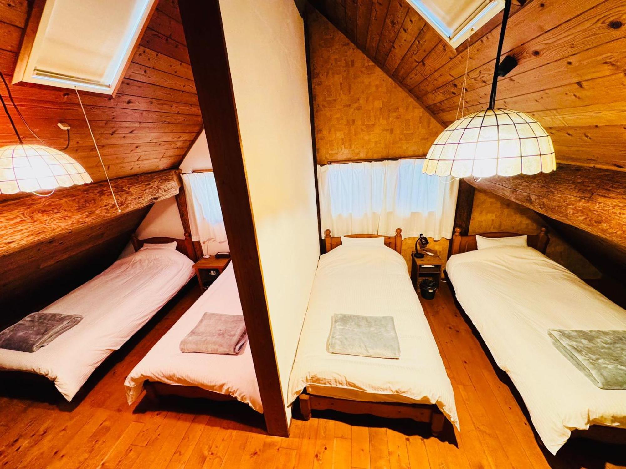 Yufuin Log House No Yado Tom Sawyer Hotel Bagian luar foto