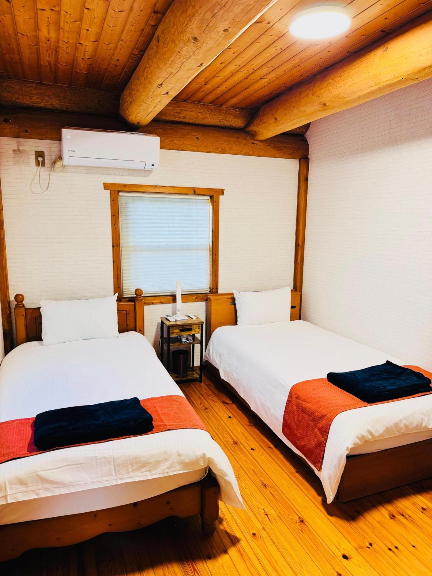 Yufuin Log House No Yado Tom Sawyer Hotel Bagian luar foto
