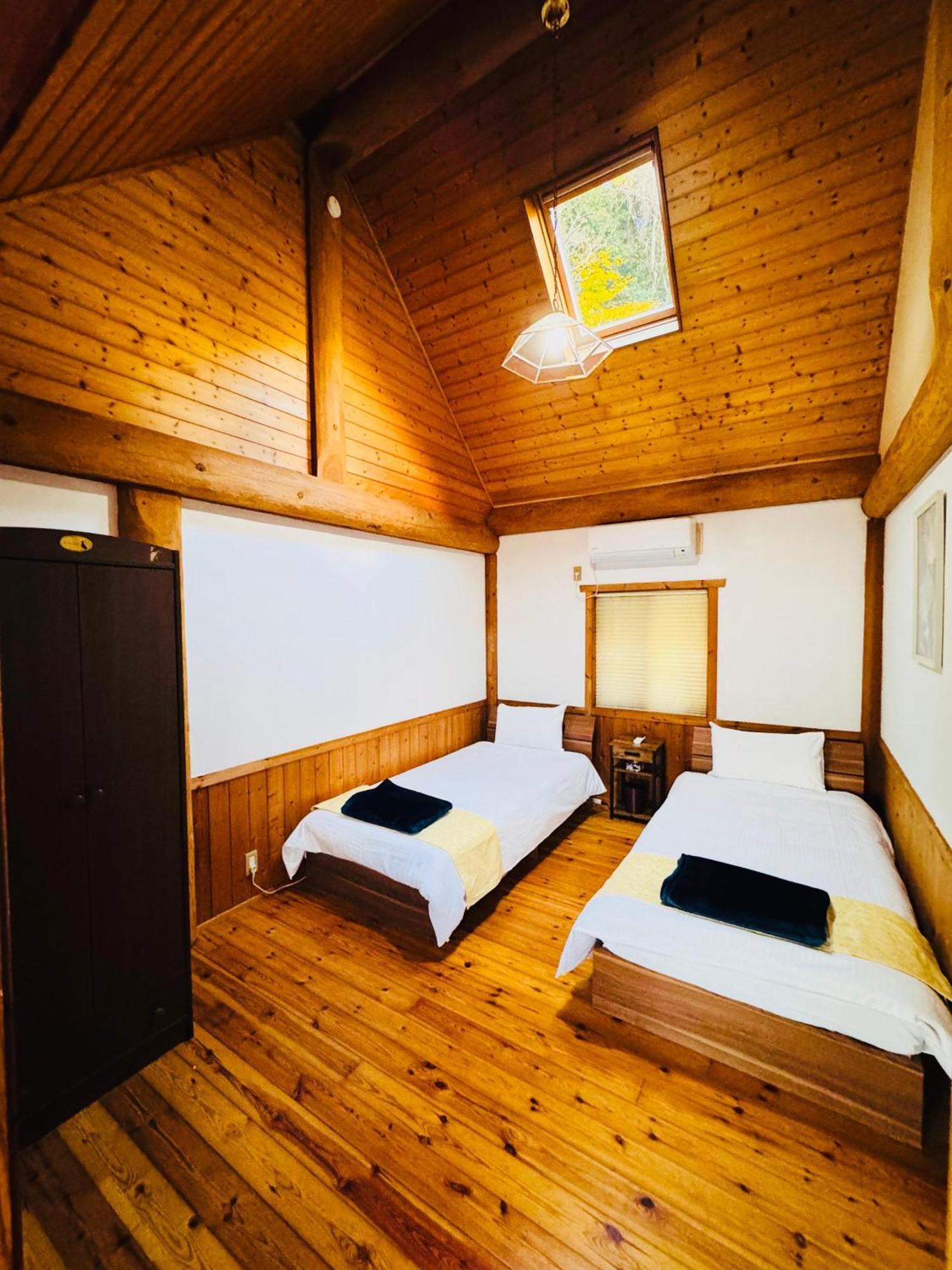 Yufuin Log House No Yado Tom Sawyer Hotel Bagian luar foto