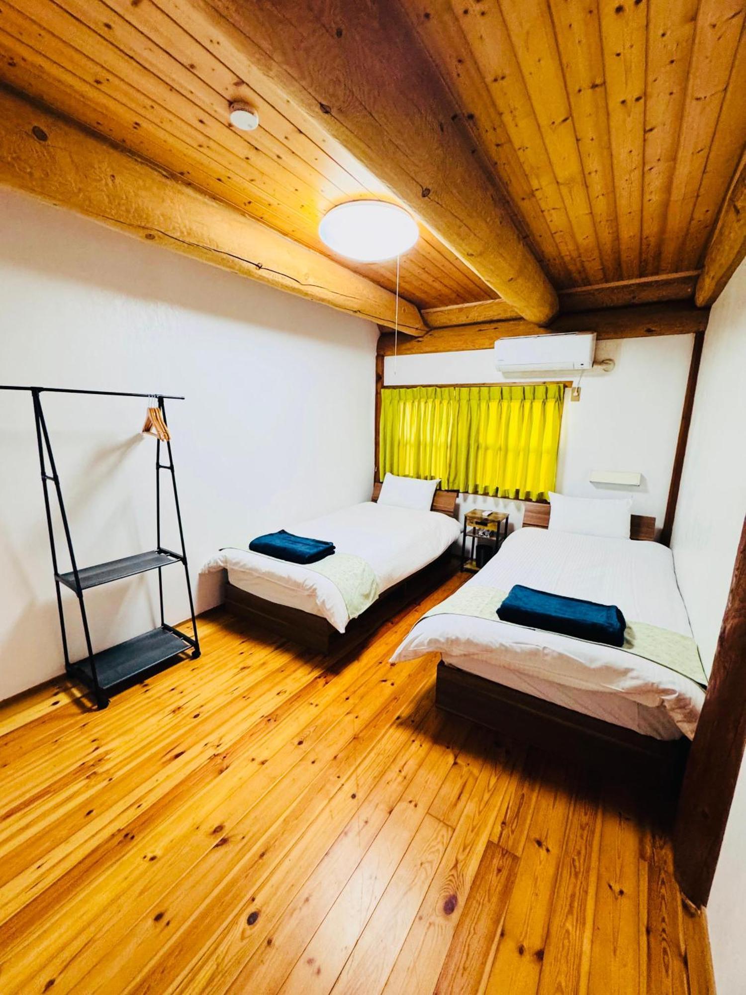 Yufuin Log House No Yado Tom Sawyer Hotel Bagian luar foto