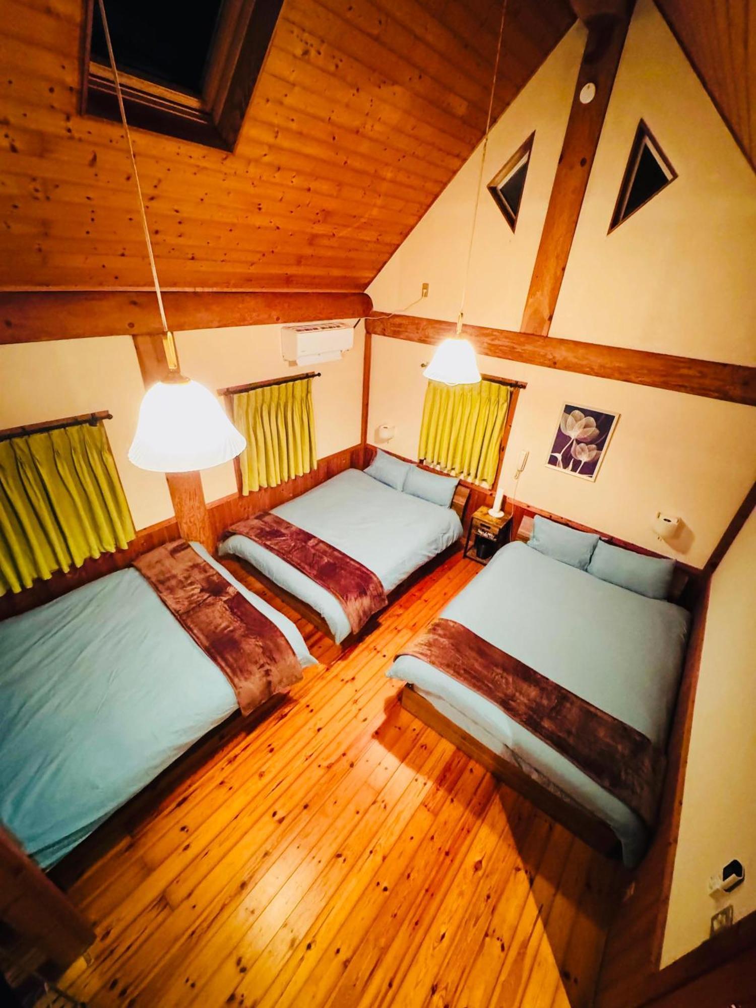 Yufuin Log House No Yado Tom Sawyer Hotel Bagian luar foto