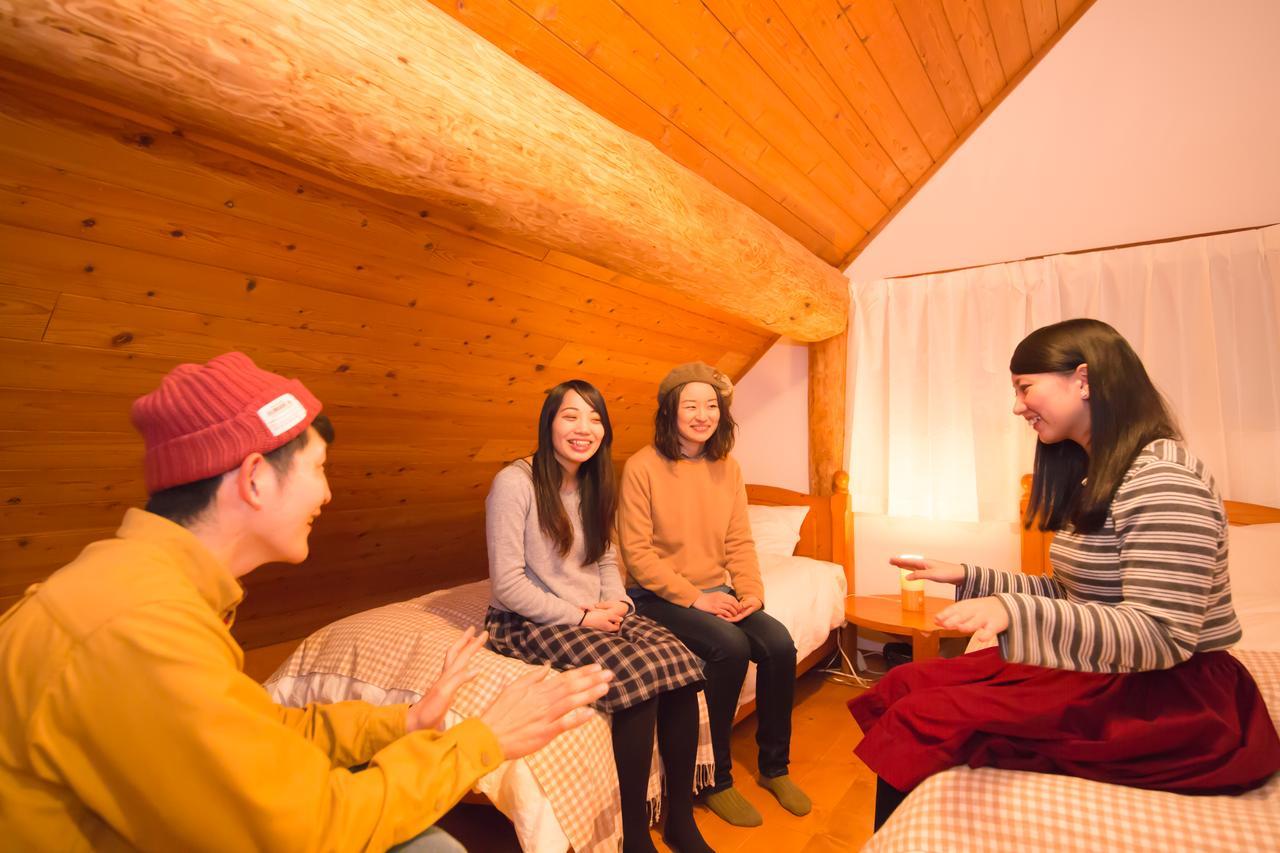 Yufuin Log House No Yado Tom Sawyer Hotel Bagian luar foto