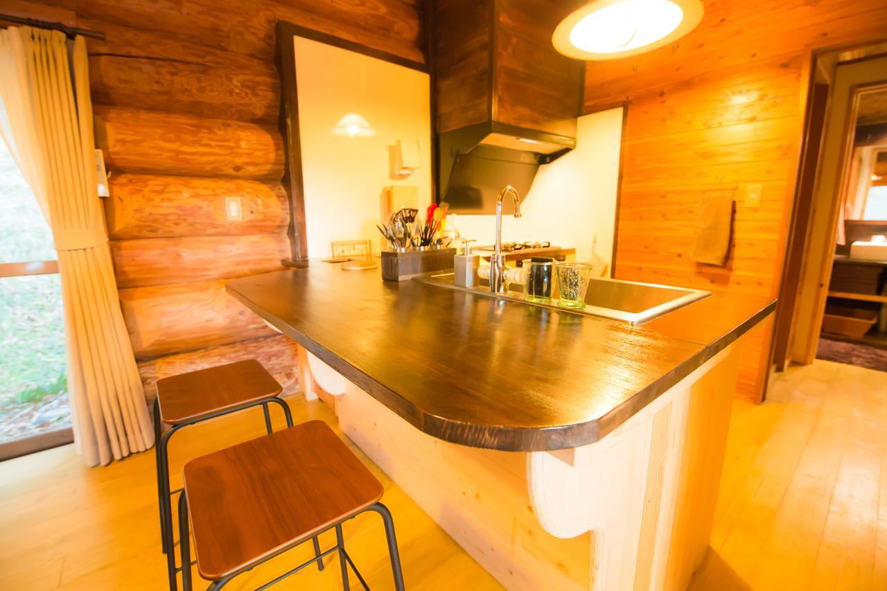 Yufuin Log House No Yado Tom Sawyer Hotel Bagian luar foto