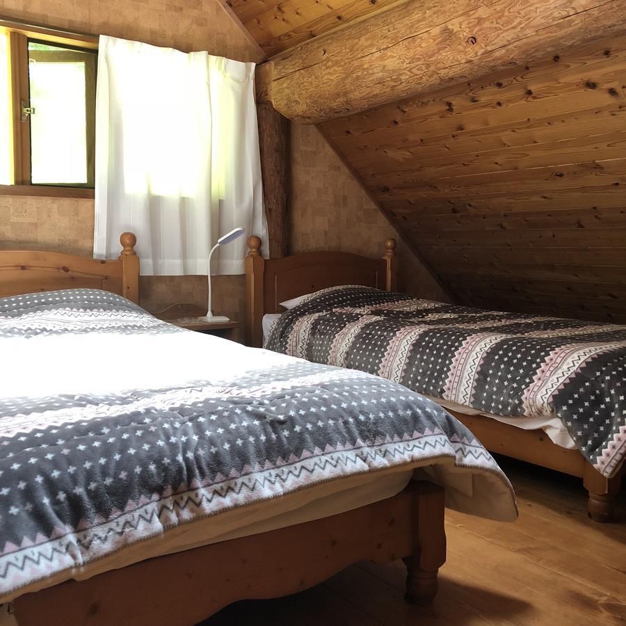 Yufuin Log House No Yado Tom Sawyer Hotel Bagian luar foto